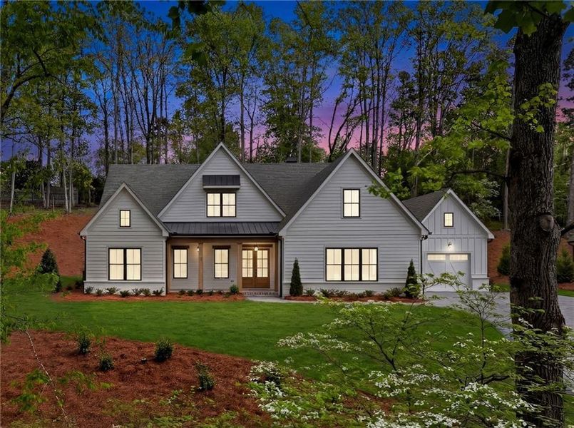 Front exterior of a new home in , Cumming, GA, highlighting curb appeal (Image 19). Front exterior of a new home in , Cumming, GA, highlighting curb appeal (Image 19).