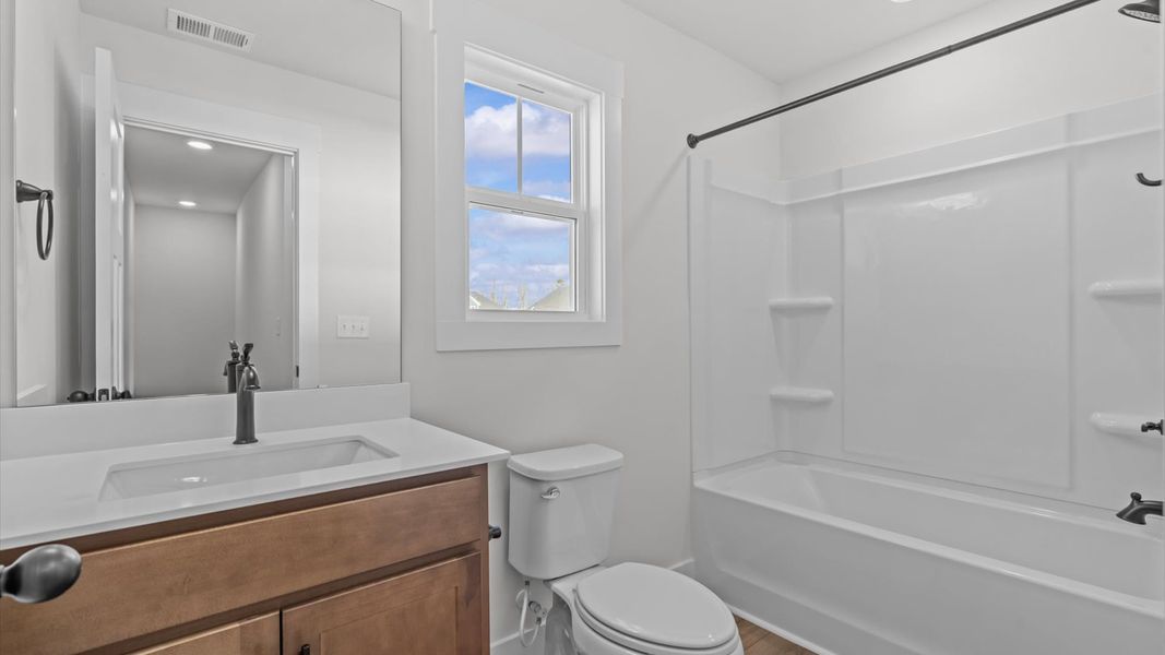 First-class guest bath featuring stylish fixtures and modern design elements