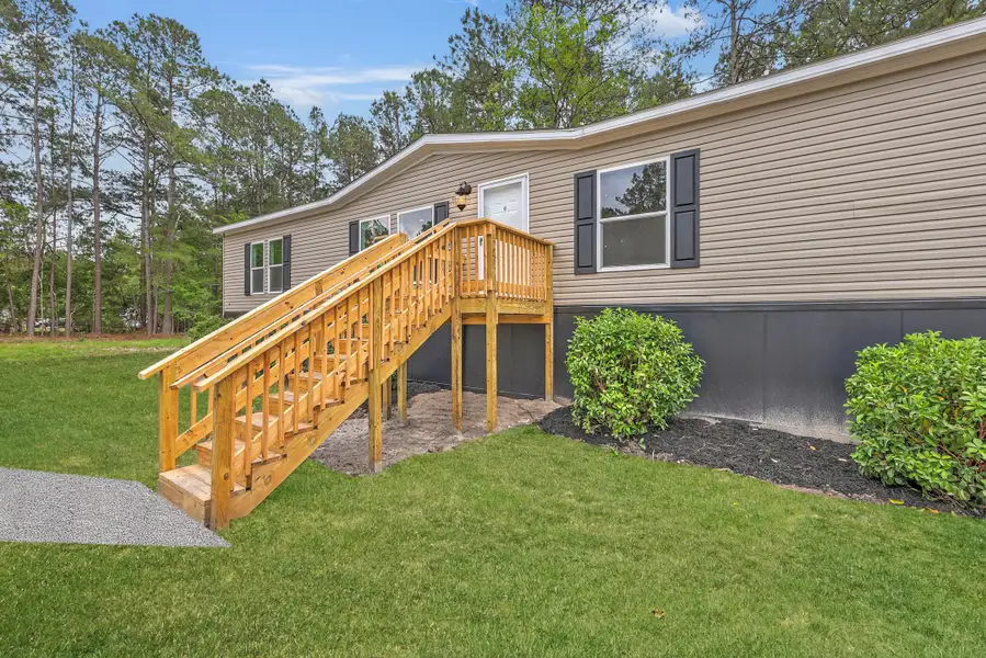 Exterior details and patio area of a home in , Ridgeville (Image 22).