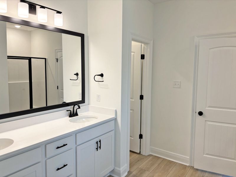 Furnished interior view inside a new home in Young Oaks, Crestview (Image 9).