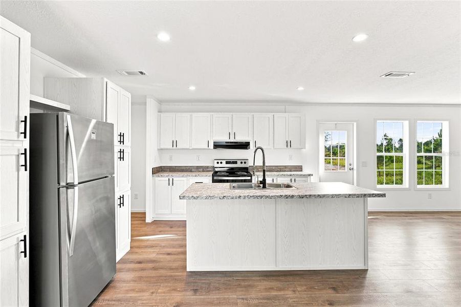 Furnished interior view inside a new home in , Okeechobee (Image 4).