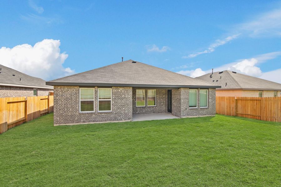 Exterior details and patio area of a home in Harrington Trails at The Canopies, Splendora (Image 4). Exterior details and patio area of a home in Harrington Trails at The Canopies, Splendora (Image 4).