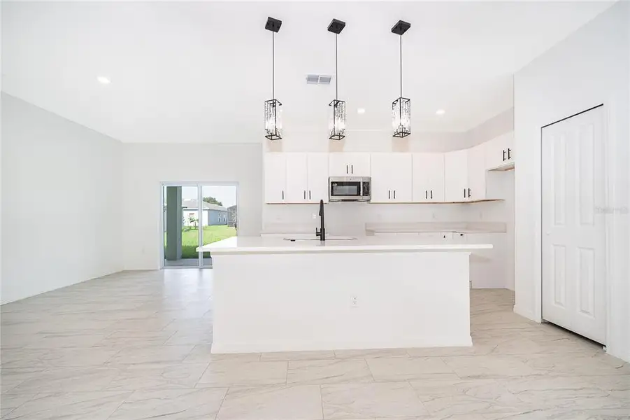 Furnished interior view inside a new home in , Kissimmee (Image 9).