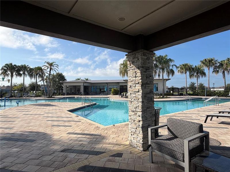 Exterior details and patio area of a home in , Groveland (Image 4).