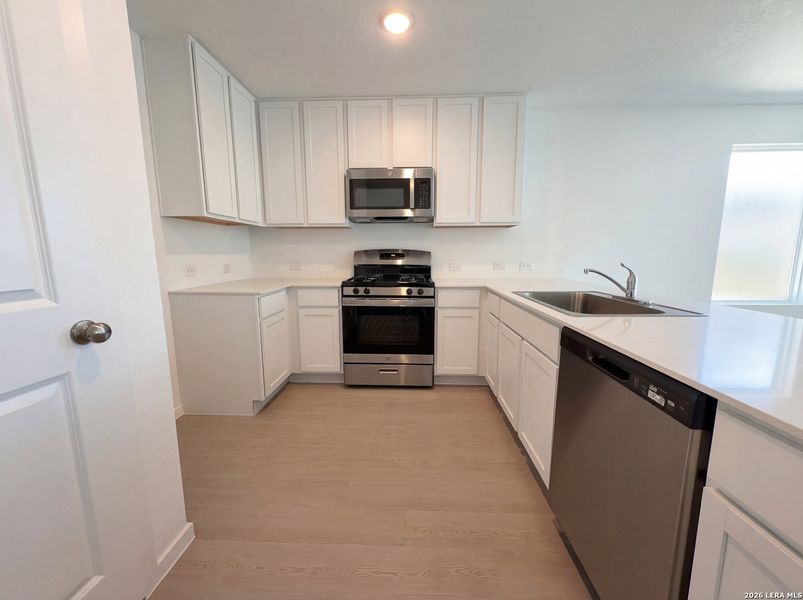 Furnished interior view inside a new home in Hunters Ranch, San Antonio (Image 4).
