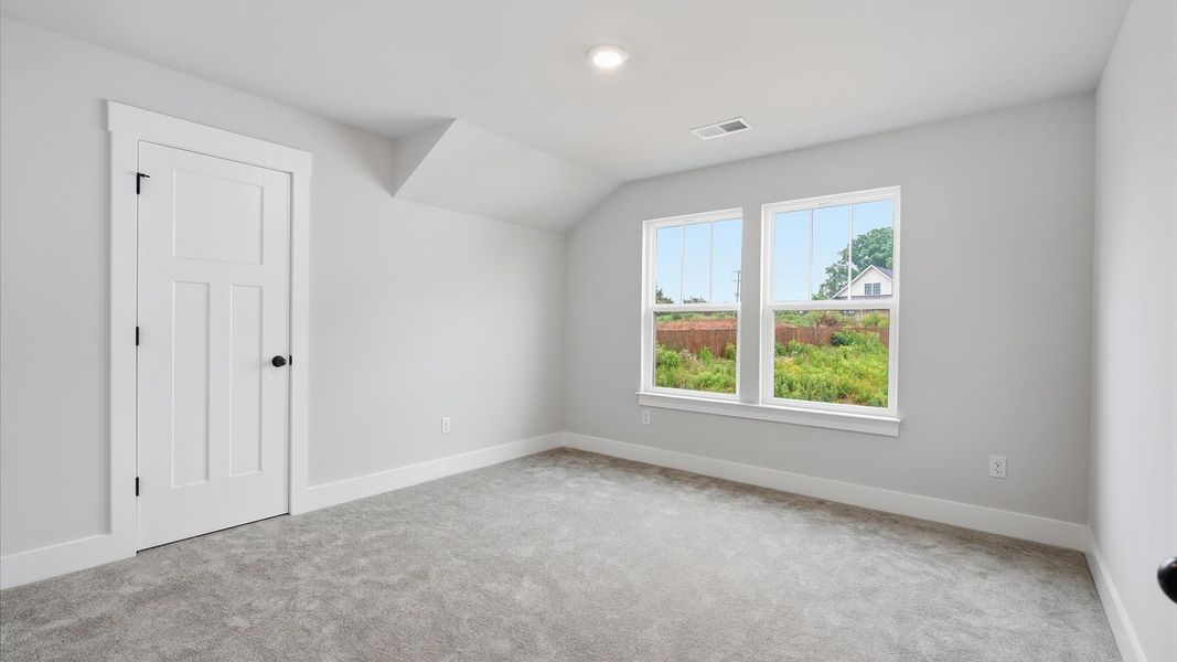 First-class bedroom with generous proportions, a walk-in closet, and beautiful natural light through large windows First-class bedroom with generous proportions, a walk-in closet, and beautiful natural light through large windows