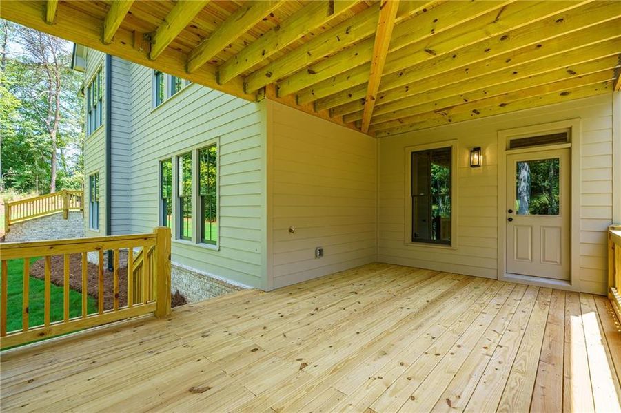 Exterior details and patio area of a home in Malone's Pond, Ball Ground (Image 33).