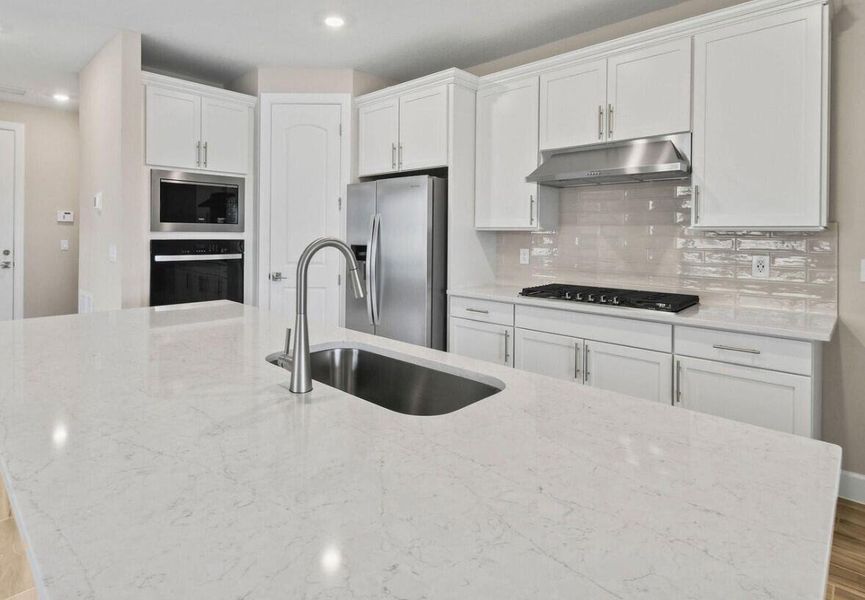 Furnished interior view inside a new home in Heron Preserve, Port St. Lucie (Image 8).