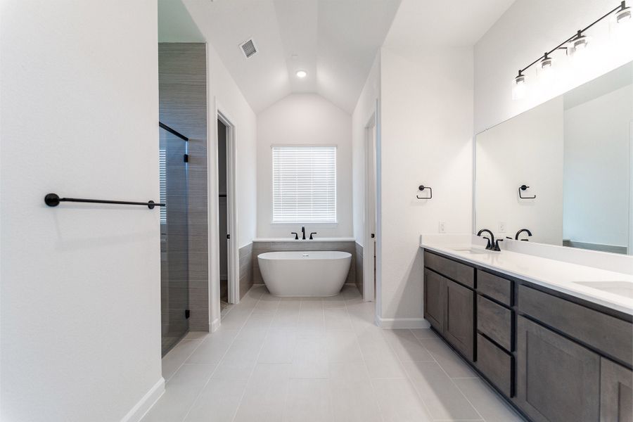 Furnished interior view inside a new home in Green Meadows, Celina (Image 9).