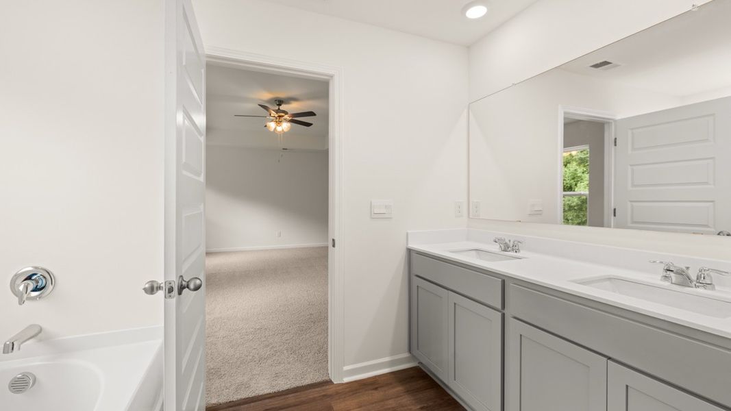 Representative furnished interior of a home built from the Hanover by D.R. Horton in The Reserve at Calcutta, Stockbridge (Image 8).