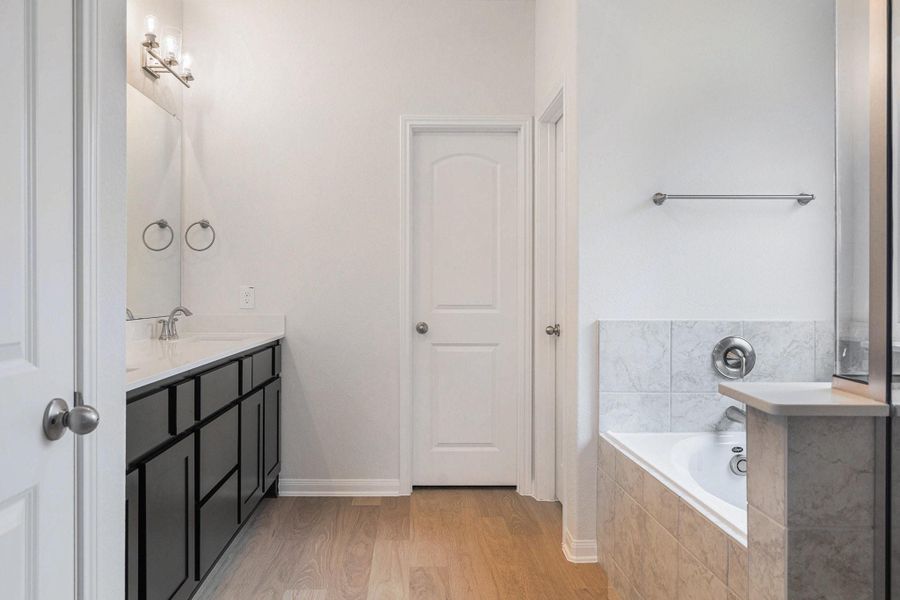 Furnished interior view inside a new home in Deer Pines, Conroe (Image 8).