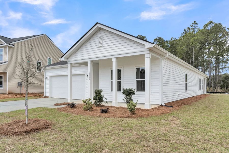 Front exterior of a new home in Watson Hill, Summerville, SC, highlighting curb appeal (Image 14).