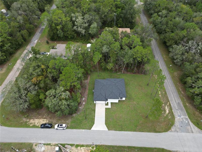 Front exterior of a new home in , Citrus Springs, FL, highlighting curb appeal (Image 24).