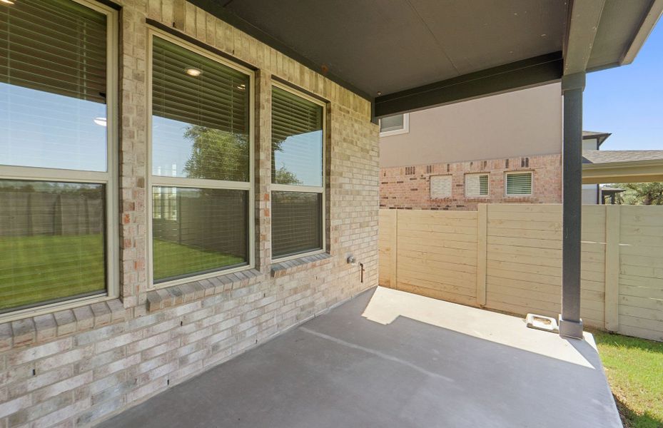 Exterior details and patio area of a home in Wolf Ranch, Georgetown (Image 4).