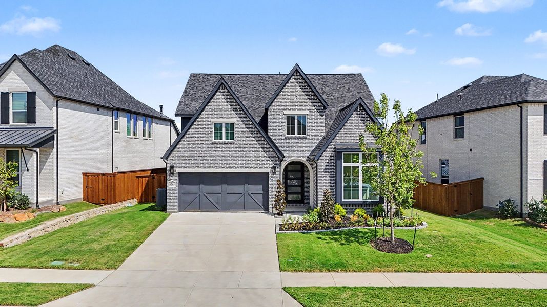 Front exterior of a new home in Aster Park, McKinney, TX, highlighting curb appeal (Image 26).
