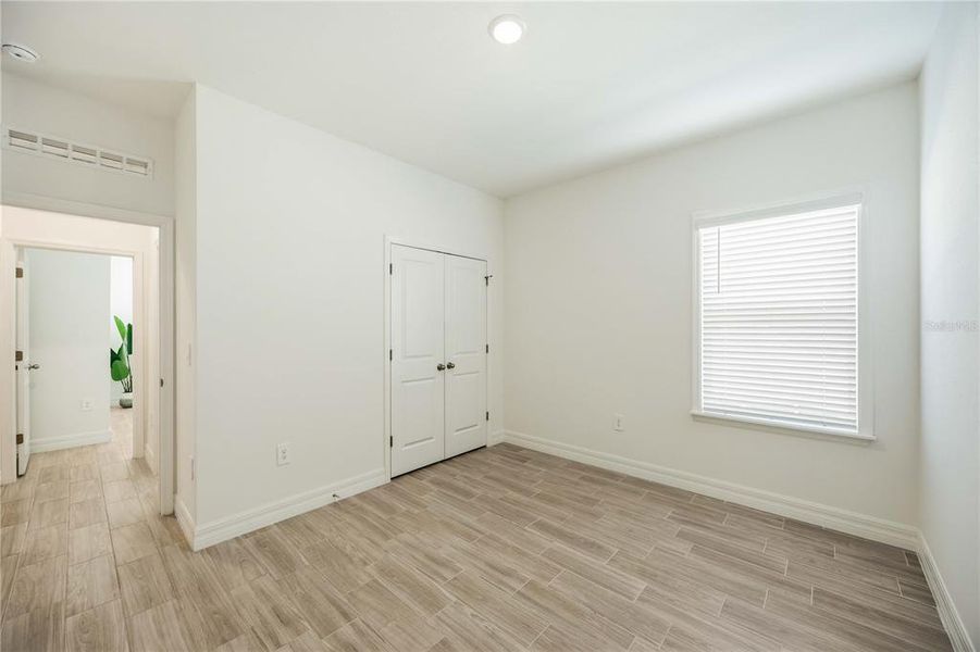 Spacious, unfurnished interior of a new home in Heritage Station, Punta Gorda (Image 15).