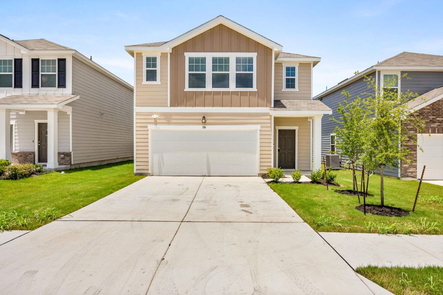 Front exterior of a new home in Cottonwood Farms, Hutto, TX, highlighting curb appeal (Image 2).