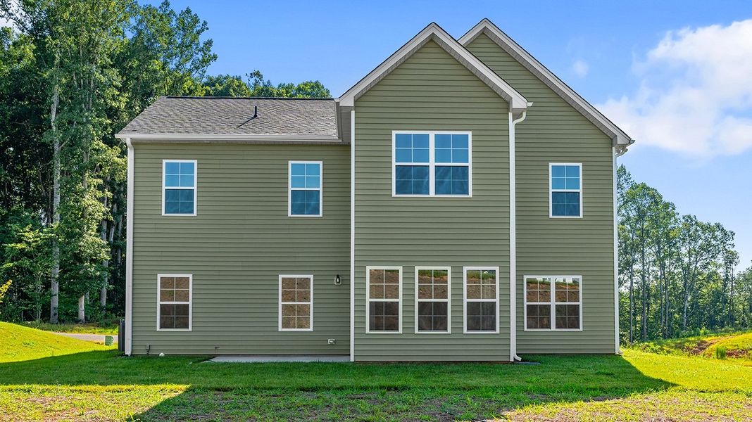 Front exterior of a new home in Brooke Hill, Lewisville, NC, highlighting curb appeal (Image 27).