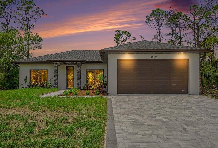 Front exterior of a new home in , Port Charlotte, FL, highlighting curb appeal (Image 23). Front exterior of a new home in , Port Charlotte, FL, highlighting curb appeal (Image 23).
