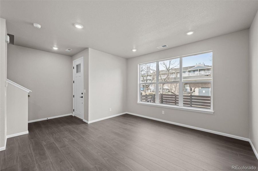 Spacious, unfurnished interior of a new home in Ralston Creek, Arvada (Image 32).