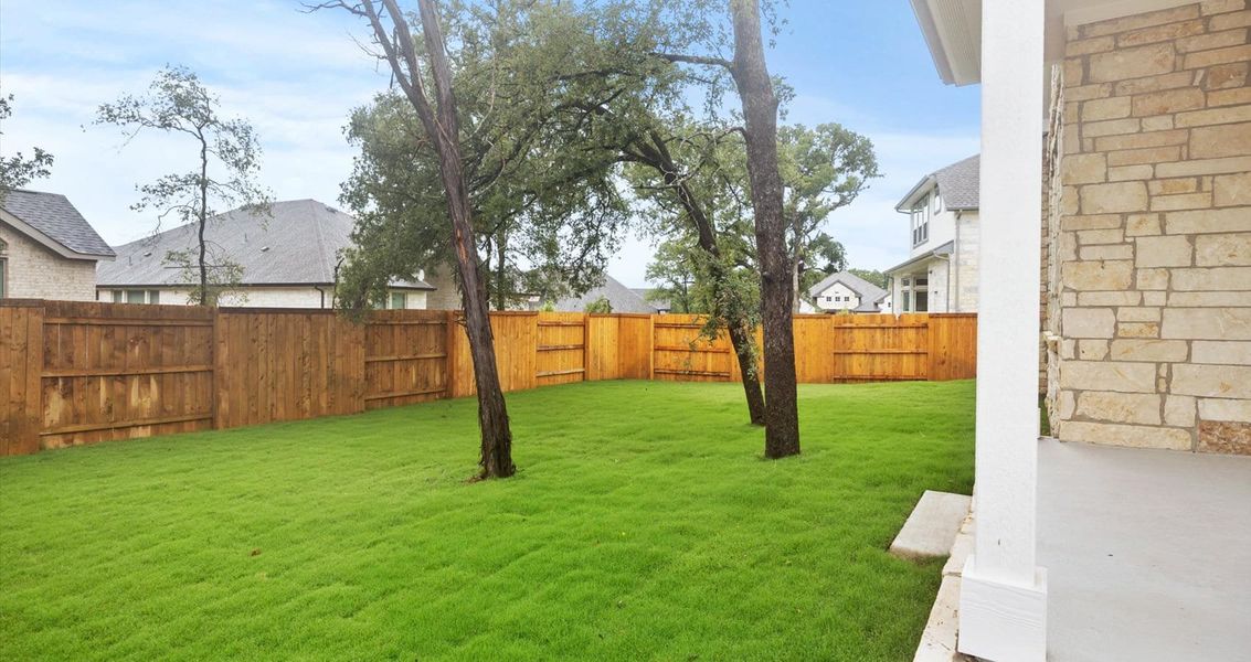 Front exterior of a new home in 6 Creeks, Kyle, TX, highlighting curb appeal (Image 2). Front exterior of a new home in 6 Creeks, Kyle, TX, highlighting curb appeal (Image 2).