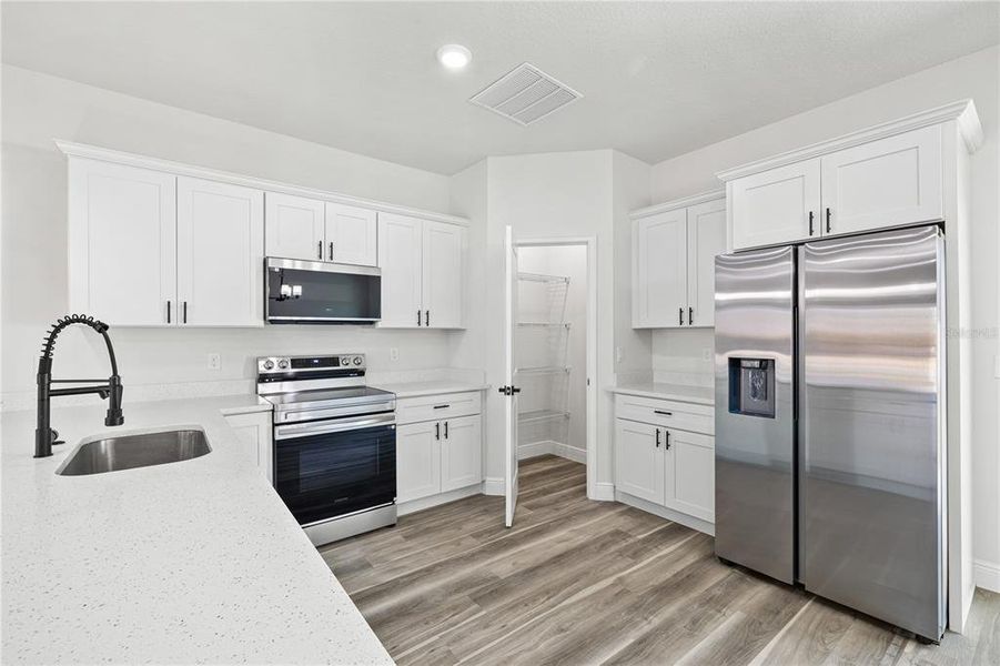 Furnished interior view inside a new home in , Ocala (Image 14).