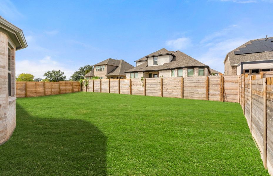 Exterior details and patio area of a home in Bluffview Reserve, Leander (Image 36).