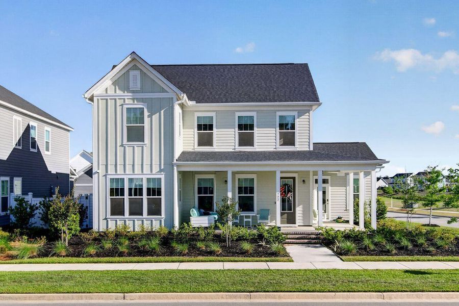 Front exterior of a new home in Nexton, Summerville, SC, highlighting curb appeal (Image 2). Front exterior of a new home in Nexton, Summerville, SC, highlighting curb appeal (Image 2).