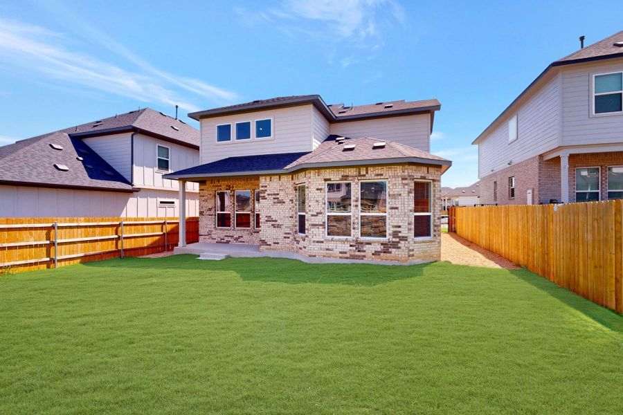 Exterior details and patio area of a home in Cascades at Onion Creek, Austin (Image 3).