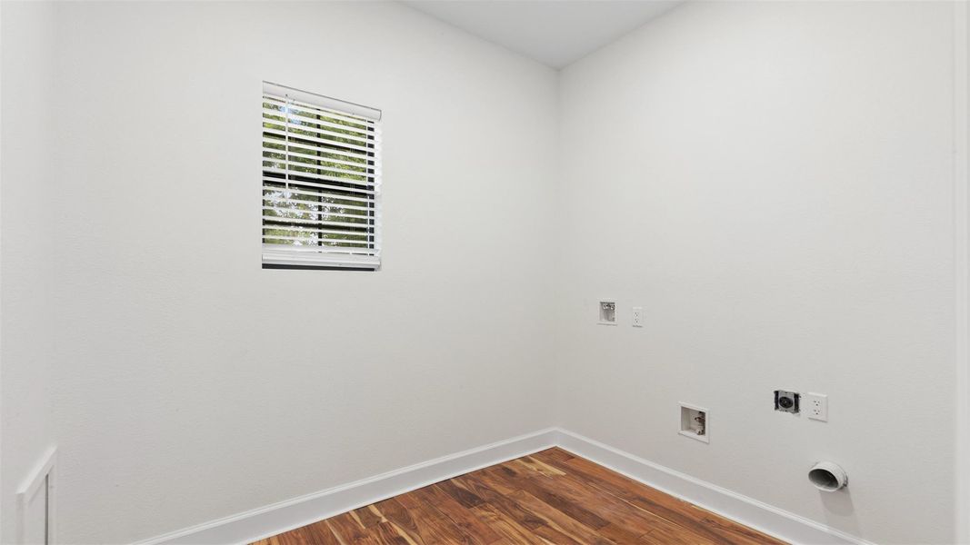 Large Laundry room located downstairs.