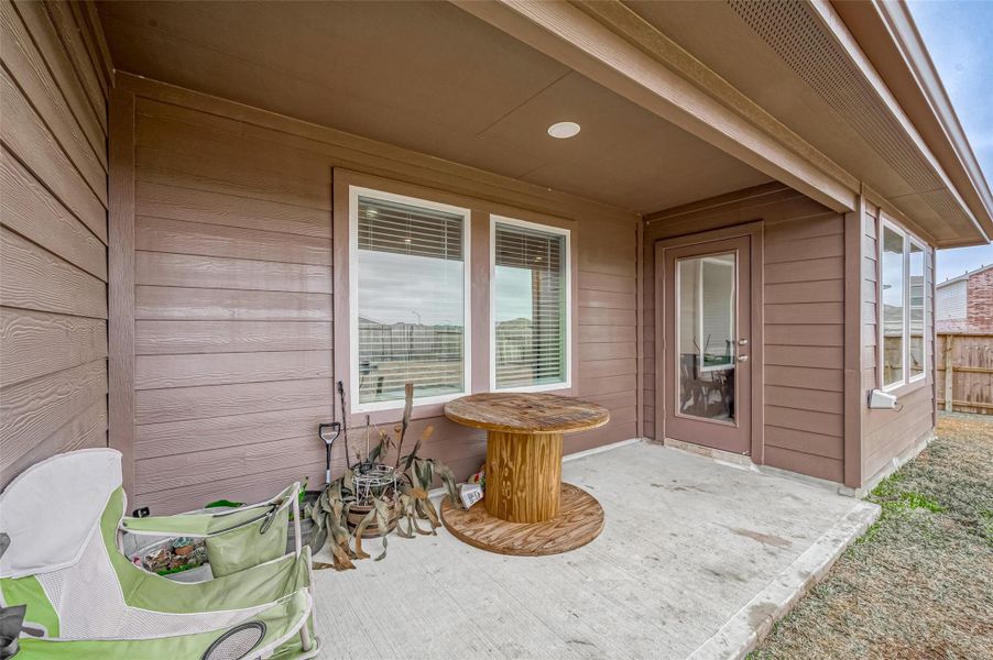 Exterior details and patio area of a home in Mill Creek, Magnolia (Image 24).