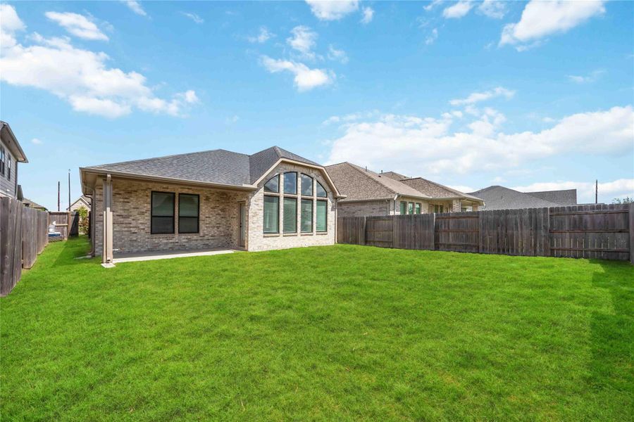 Exterior details and patio area of a home in Elyson 45' & 70', Katy (Image 24).