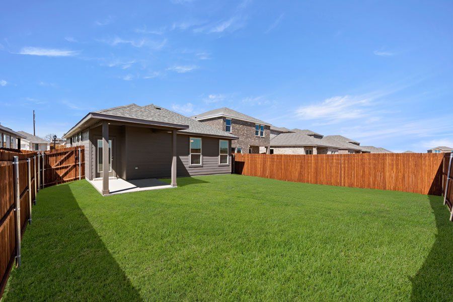 Representative exterior photo of a completed home built from the Birch by Impression Homes in Creekside Ranch, Blue Ridge, TX (Image 26).