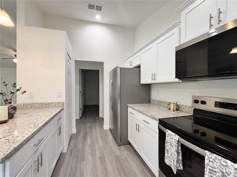 Furnished interior view inside a new home in , Dunnellon (Image 39).