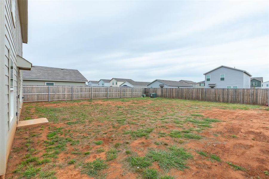 Exterior details and patio area of a home in Waterside at Cedar Creek, Abilene (Image 3).