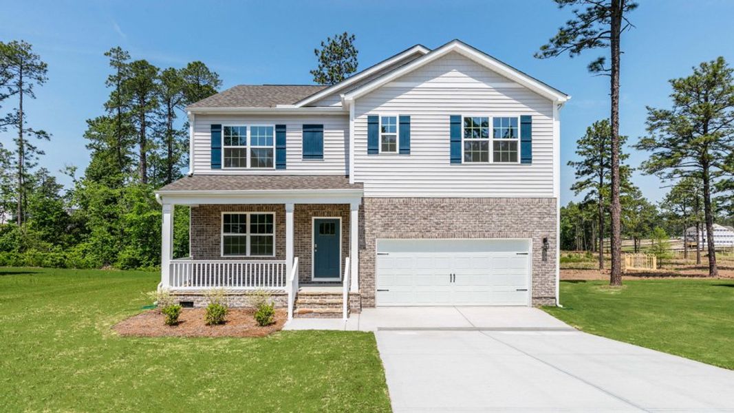 Representative exterior photo of a completed home built from the Hayden by D.R. Horton in Gretchen Pines, West End, NC (Image 1). Representative exterior photo of a completed home built from the Hayden by D.R. Horton in Gretchen Pines, West End, NC (Image 1).