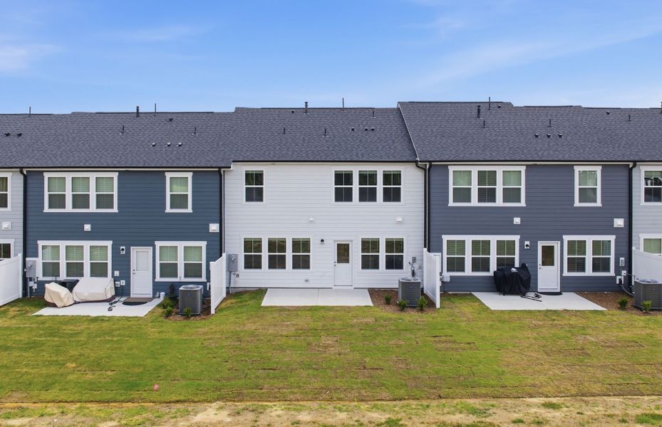 Exterior details and patio area of a home in Saunders Farm, Willow Spring (Image 3).