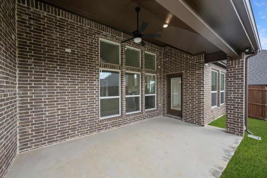 Exterior details and patio area of a home in High Country, Burleson (Image 3). Exterior details and patio area of a home in High Country, Burleson (Image 3).