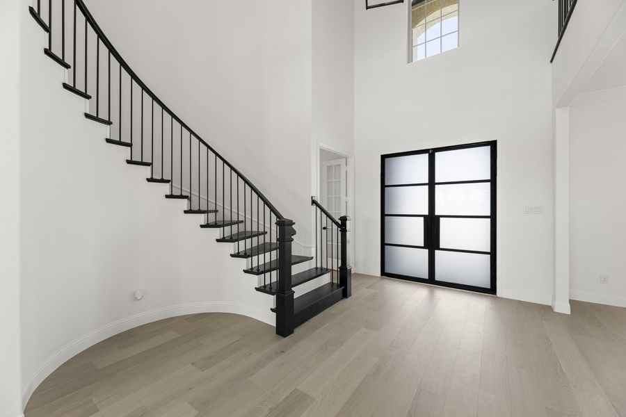 Representative unfurnished interior of a home built from the Hadley by Windsor Homes in Winding Creek, Rockwall (Image 16).