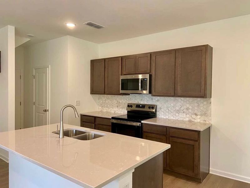 Kitchen featuring Roosevelt Collection Finishes Construction Progress