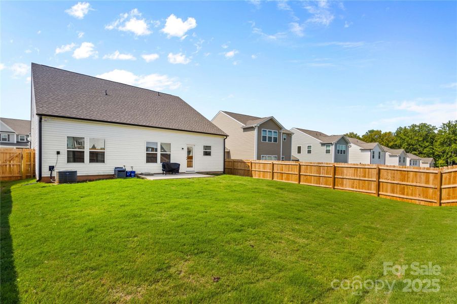 Front exterior of a new home in , Troutman, NC, highlighting curb appeal (Image 25).