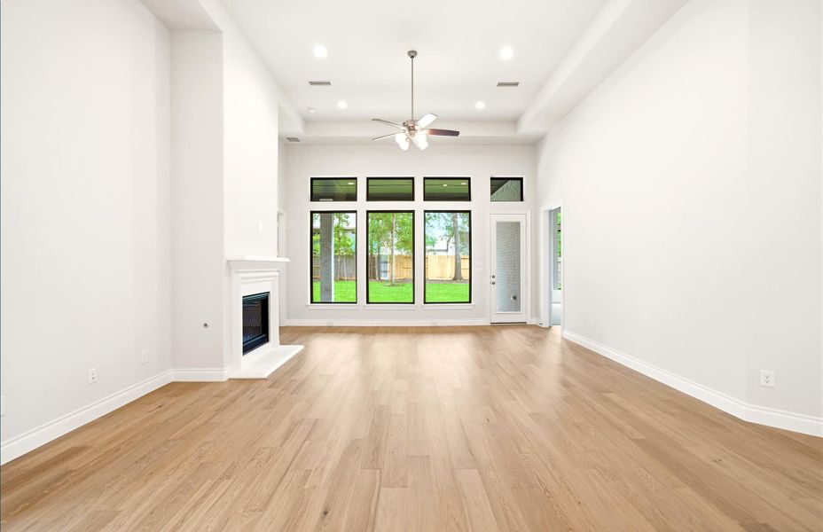 Spacious, unfurnished interior of a new home in The Woodlands Hills 65′, Willis (Image 45).