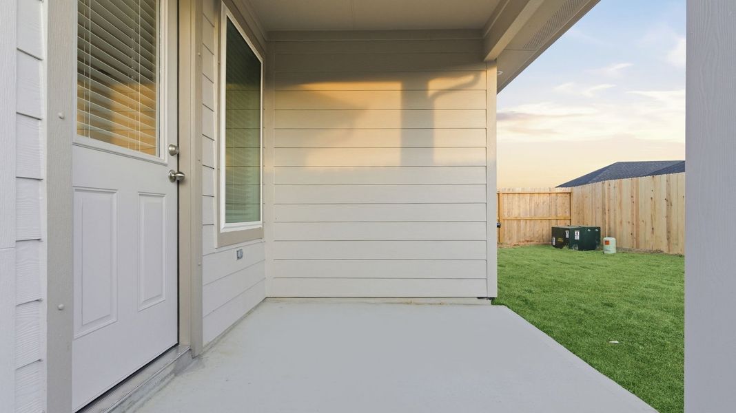 Exterior details and patio area of a home in Lakes at Westland Ranch, League City (Image 3).