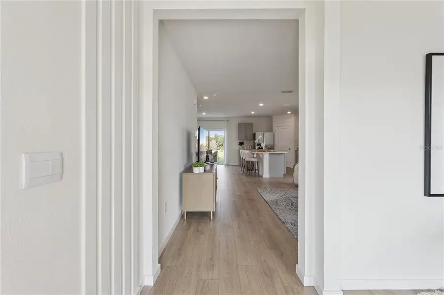 Furnished interior view inside a new home in Crossroads at Kelly Park, Apopka (Image 11).