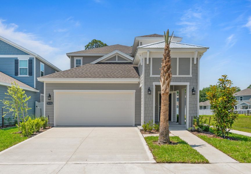 Representative exterior photo of a completed home built from the Amelia II by Century Communities in The Preserve at Concourse Crossing, Fernandina Beach, FL (Image 1).