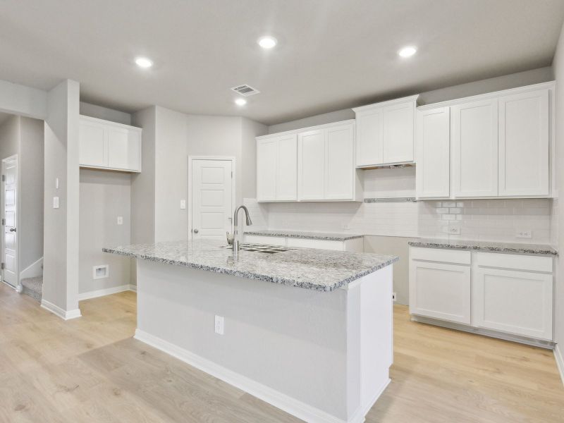 Kitchen in the San Jacinto floorplan at a Meritage Homes community.