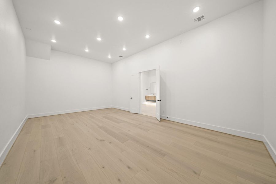 Spacious, unfurnished interior of a new home in Bridgeland, Cypress (Image 39).