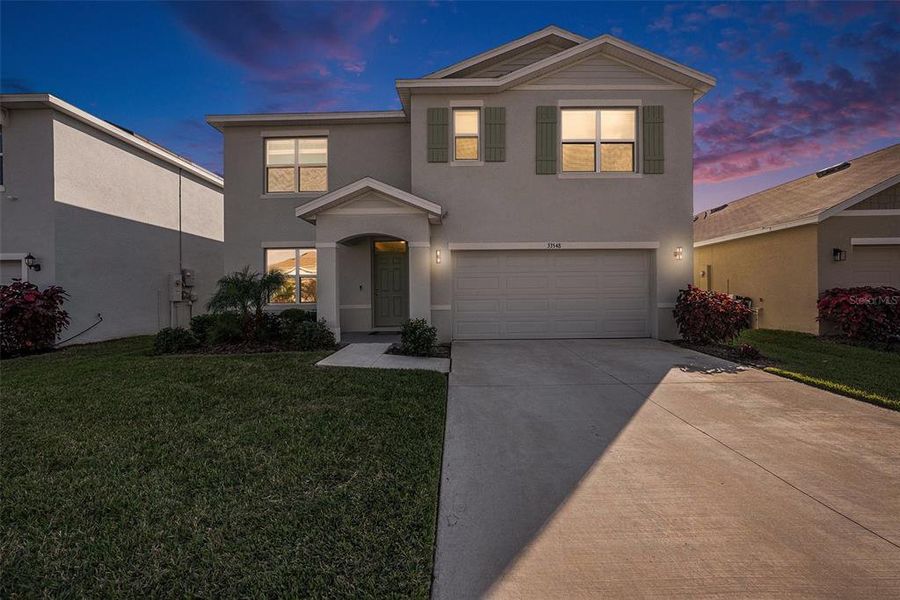 Front exterior of a new home in , Wesley Chapel, FL, highlighting curb appeal (Image 26).