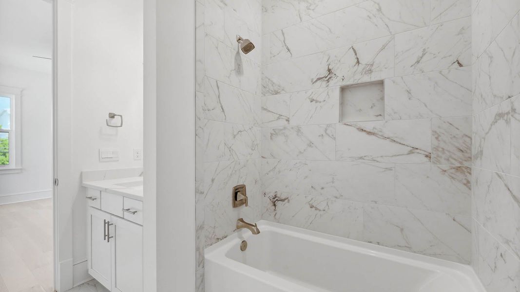 Representative furnished interior of a home built from the Cayman by D.R. Horton in Parkside, Santa Rosa Beach (Image 13).