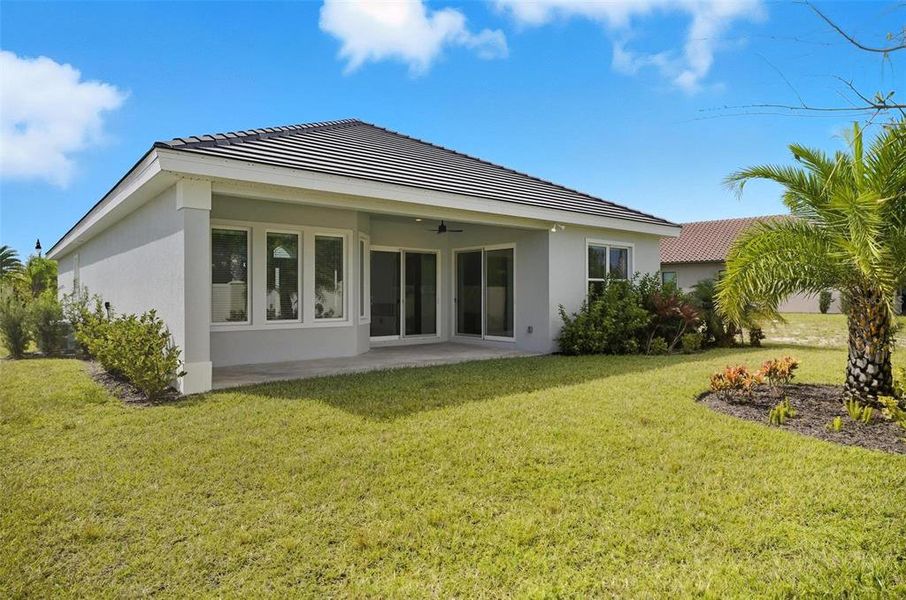 Exterior details and patio area of a home in Marina Del Palma, Palm Coast (Image 26).